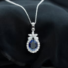 Oval Cut Created Blue Sapphire and Moissanite Silver Floral Statement Pendant - Rosec Jewels