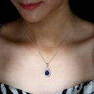 Oval Cut Created Blue Sapphire and Moissanite Silver Floral Statement Pendant - Rosec Jewels